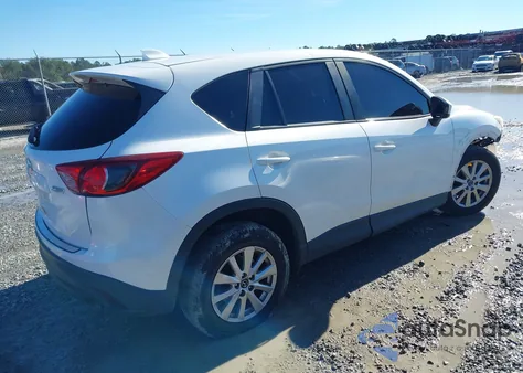 2013 Mazda Cx-5 Touring z USA, uszkodzony, nr VIN JM3KE4CE0D0164032